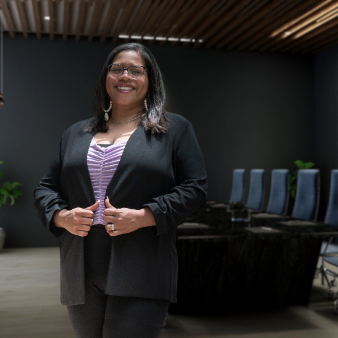 Kimberly, a thought leader and workplace culture strategist, stands confidently in a professional setting, wearing a black blazer and smiling. The accompanying text highlights her expertise in fostering a people-first culture, leadership development, and employee engagement through tailored strategies.
